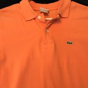 Men’s orange Lacoste polo shirt size 5. Medium